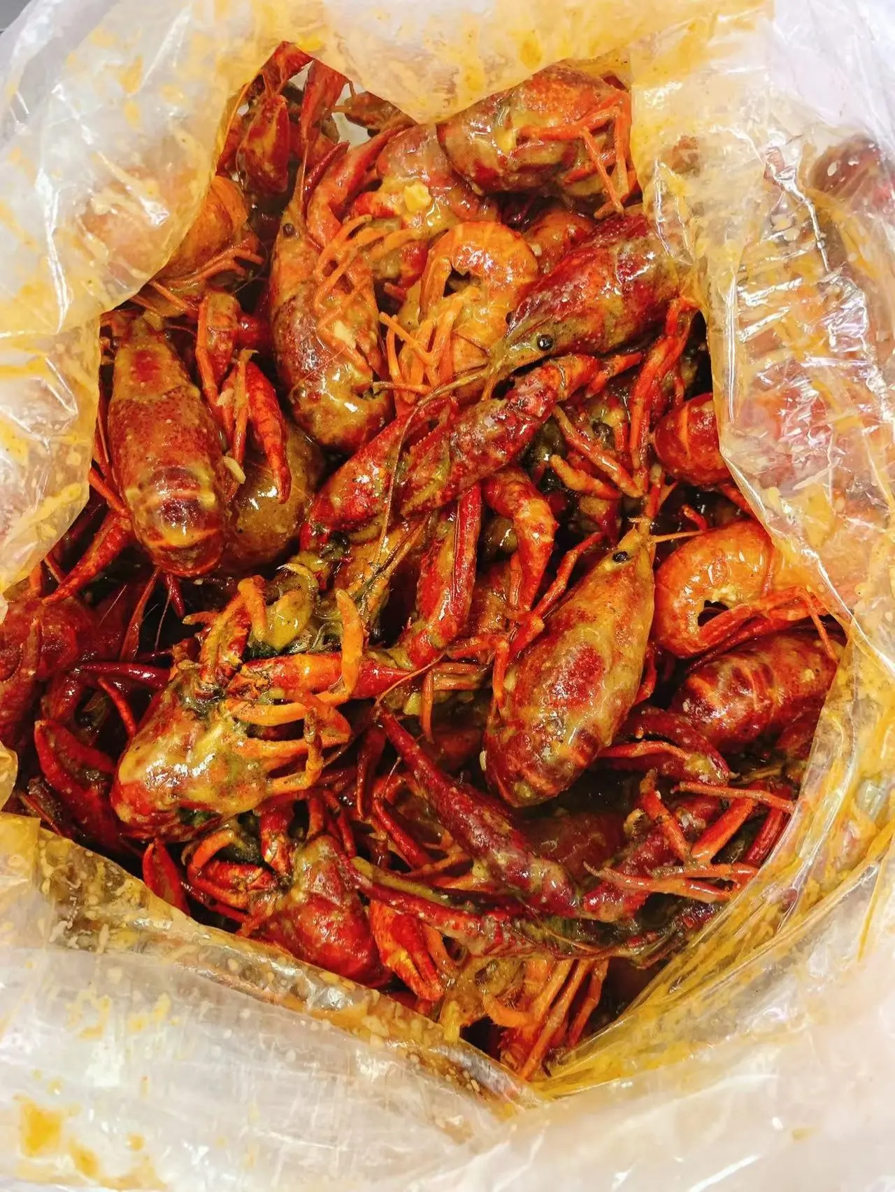 Seasoned spicy crayfish packed in plastic bag at Captain Crab, a Seafood Restaurant in Lufkin